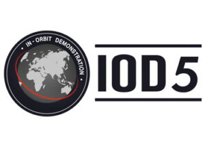 Logo with a world map labeled "In-Orbit Demonstration" and "IOD 5" text to the right.