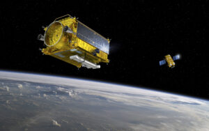 Two satellites orbit above Earth, with one close and the other distant, against a backdrop of space.