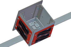 A 3D model of a cube-shaped device with red panels and connectors on a metal beam.