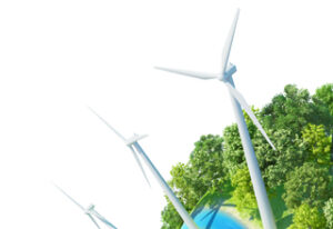 Three white wind turbines near a forested area, situated beside a small body of water against a clear sky.