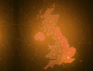 Abstract digital map of the UK with geometric lines and dots on a warm, glowing background.