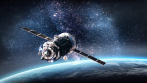 Satellite orbiting Earth with a star-filled galaxy backdrop in space.