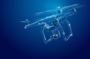 Futuristic wireframe digital drone against a dark blue background, glowing with bright lines and dots.
