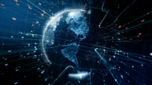 Digital globe composed of glowing blue particles, intersected by dynamic lines on a dark background.