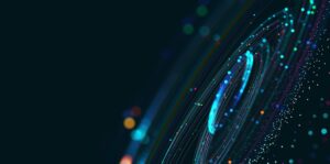 Abstract digital art with swirling light trails and colorful bokeh on a dark background.