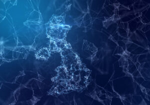 Digital network map outline of the UK against a dark, abstract background.