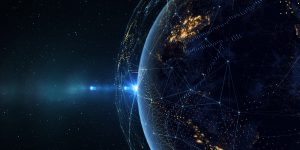 Digital Earth in space with glowing network connections and scattered bright lights against a starry backdrop.