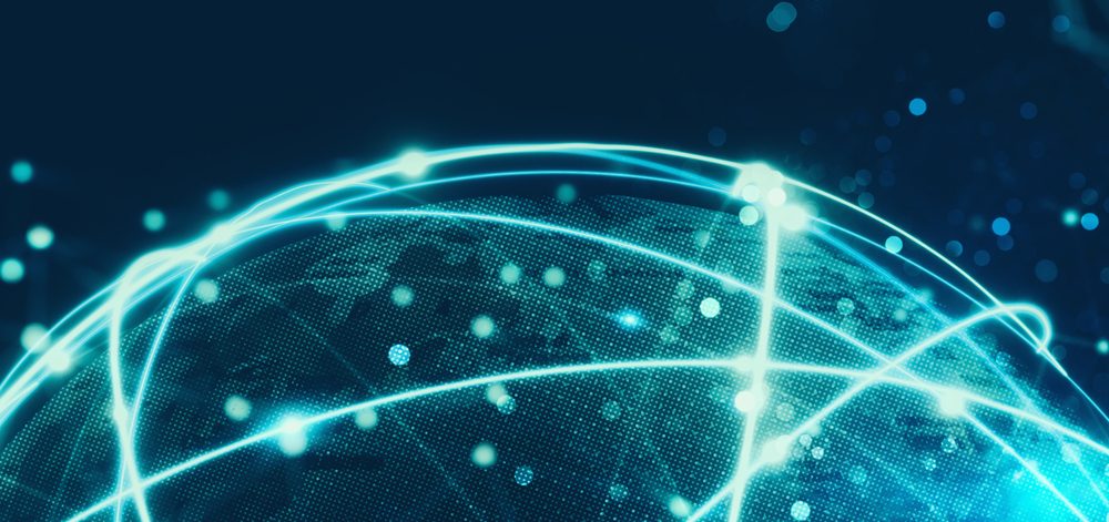 Glowing digital globe with connected lines and dots on a dark blue background, symbolizing global technology.