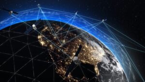 Satellites orbiting Earth transmit signals over North America, illustrating a global communication network.