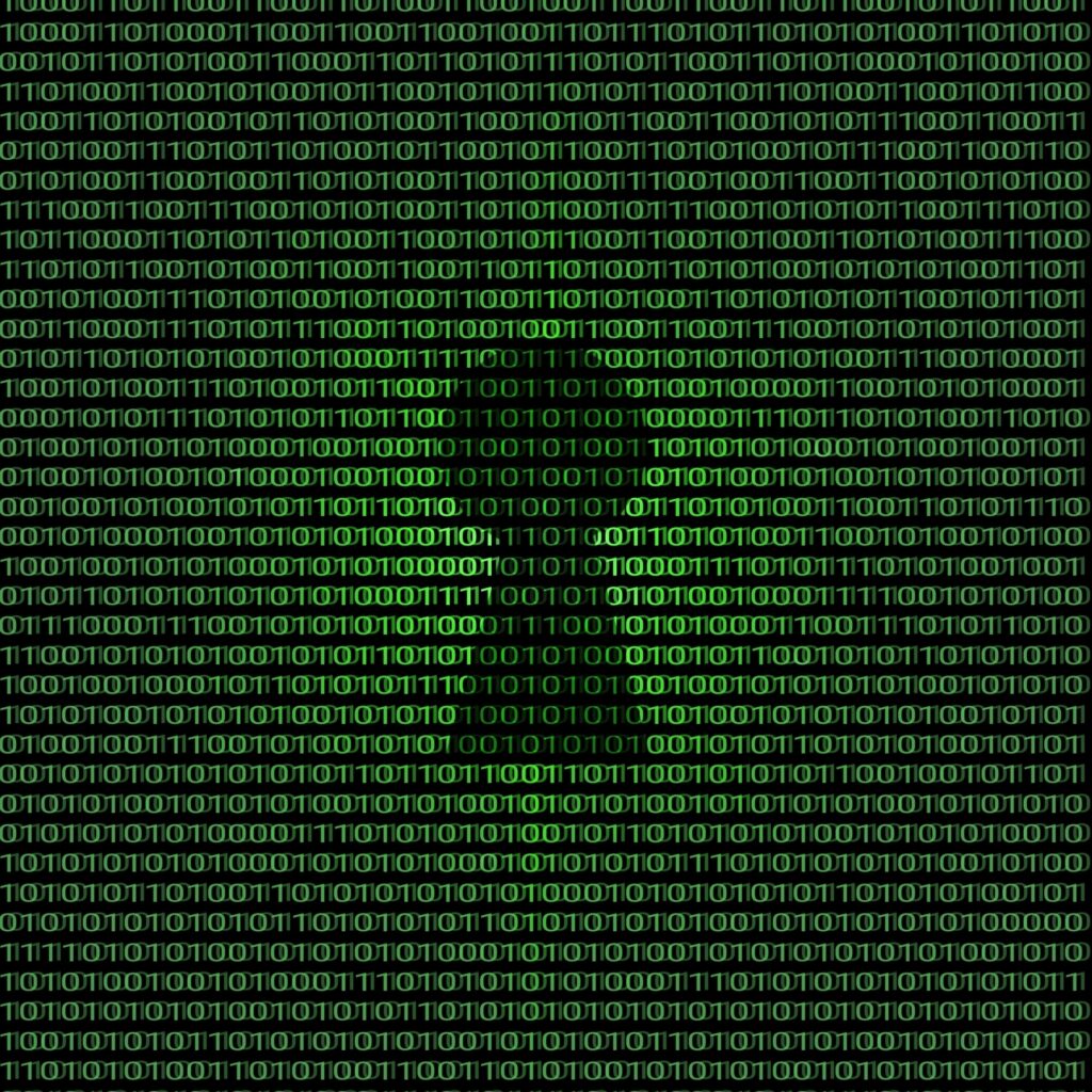 Green binary code forms a dollar sign on a black background, symbolizing digital money or cryptocurrency.